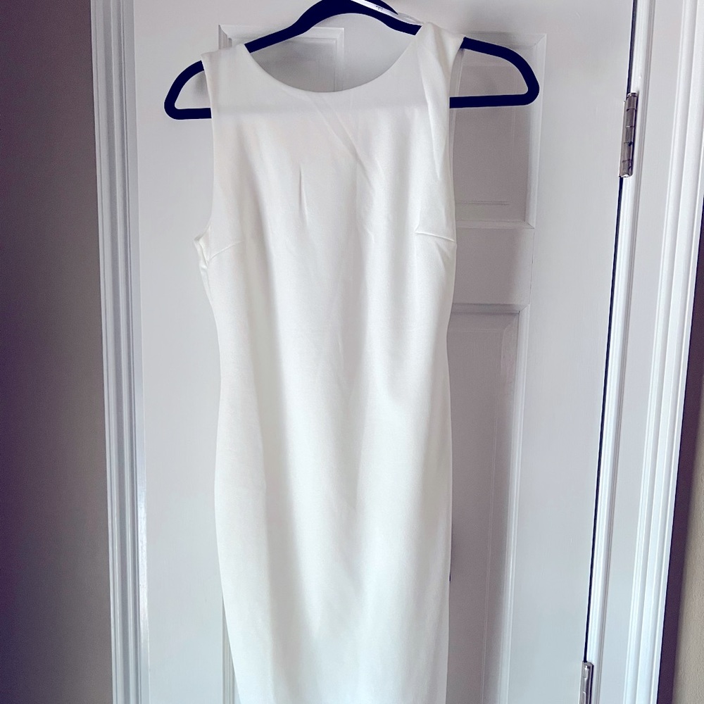 White low backless dress! Perfect for a bride to be! Never worn still has tags!